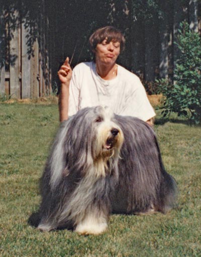 Smokey and his mommy in the back garden on a beautiful summer day.